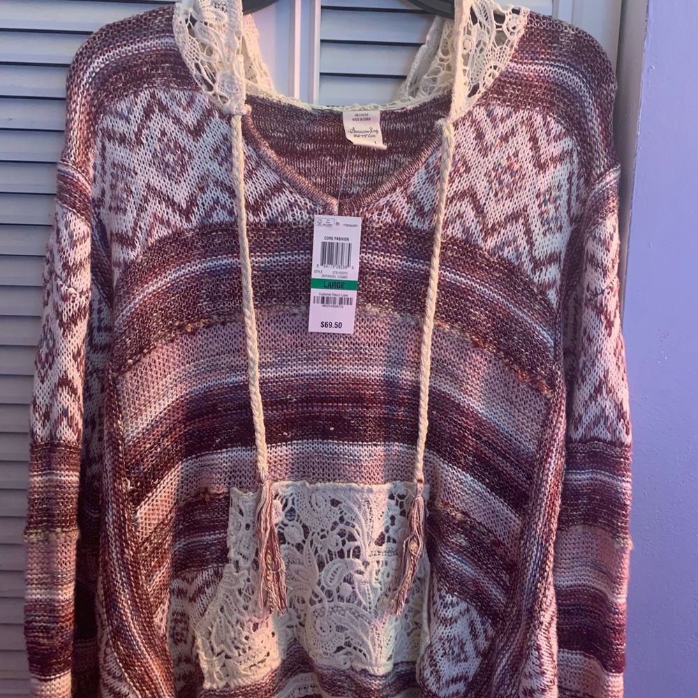 A trendy hoodie also known as a Baja jacket/hoodie